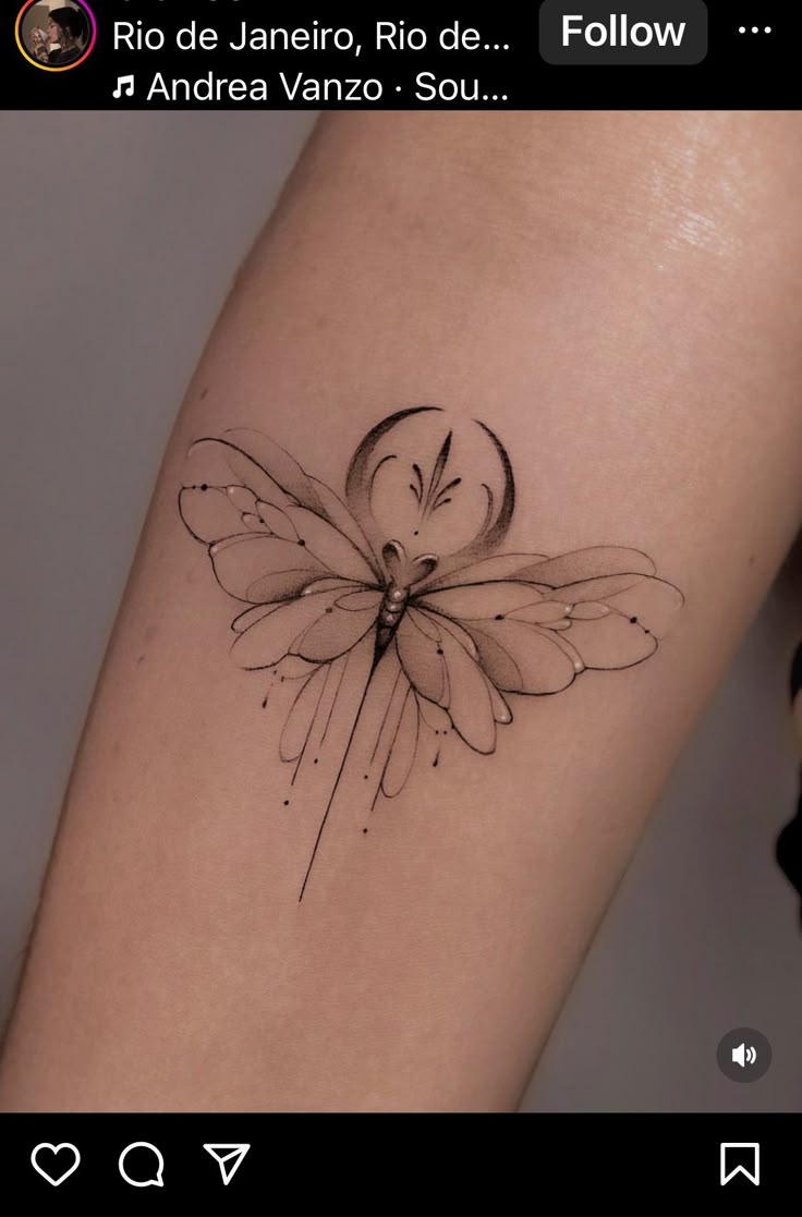 a small tattoo on the leg of a woman