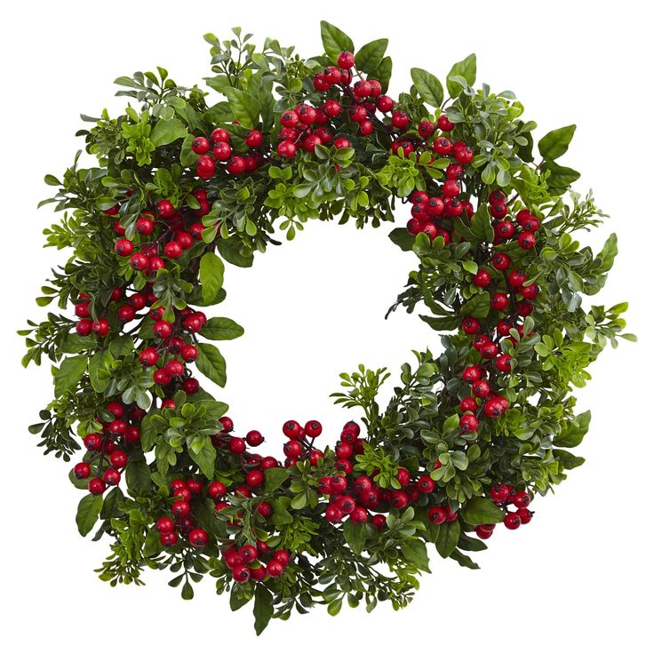 a christmas wreath with red berries and green leaves