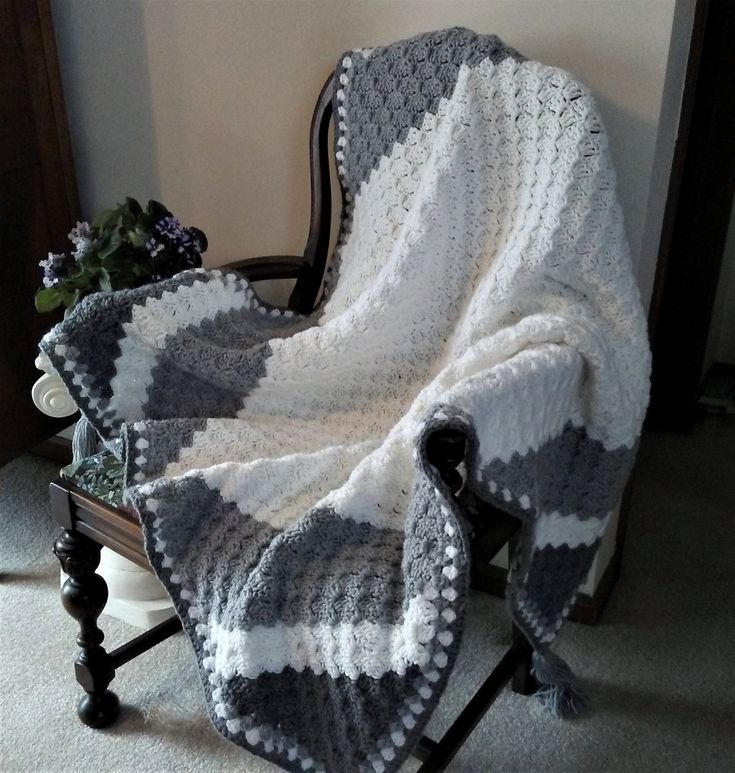 a chair with a blanket on top of it