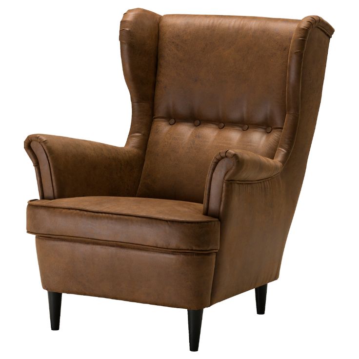 a brown leather chair sitting on top of a white floor