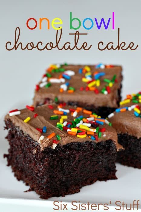 two chocolate brownies with sprinkles on top and the words one bowl chocolate cake above them