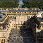 an aerial view of a large building with many windows