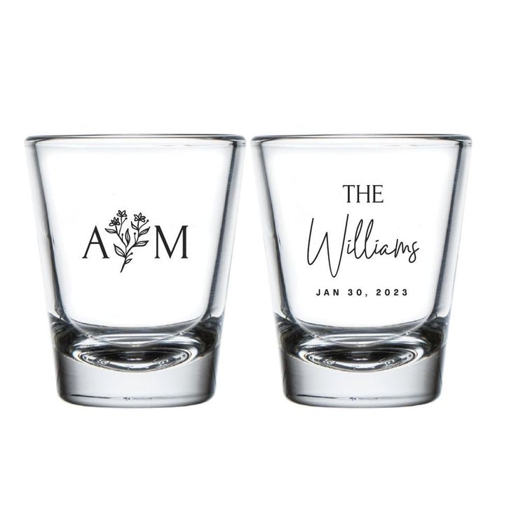 two shot glasses with the names and date printed on them