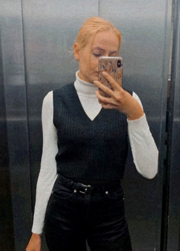 Black Vest Sweater Outfit, V Neck Sweater With Turtle Neck, Knit Vest And Turtleneck Outfit, Layering With A Turtleneck, Black Turtleneck Outfit Office, Black Knit Vest Outfits For Women, Vest Over Turtleneck Outfit, Turtle Neck And Sweater Vest, Black Sleeveless Sweater Outfit