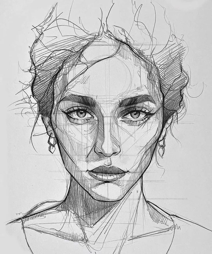 a black and white drawing of a woman's face