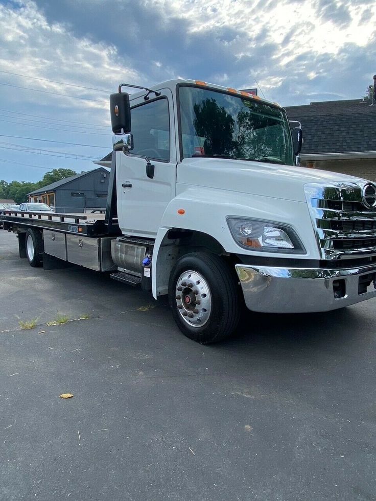 a large white truck parked in a parking lot