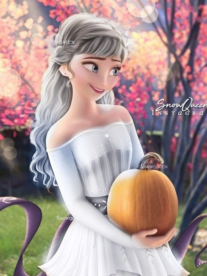 a woman in white dress holding a pumpkin