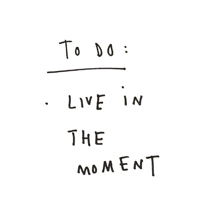 the words to do live in the moment are written on a white paper with black ink