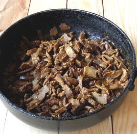 the food is cooked and ready to be eaten in the skillet on the table