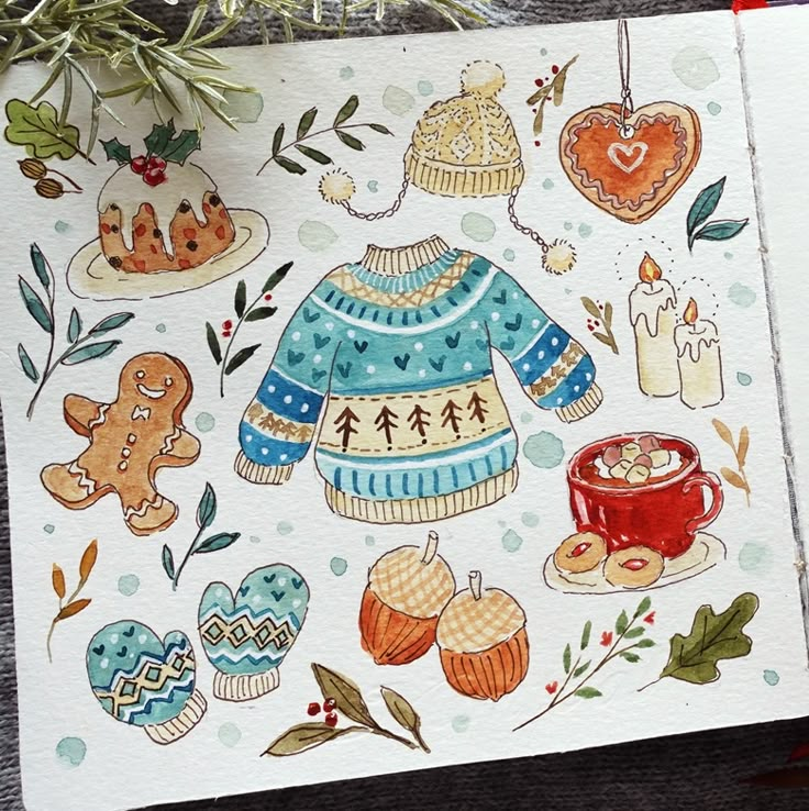 a card with an illustration of sweaters, cookies and cupcakes on it