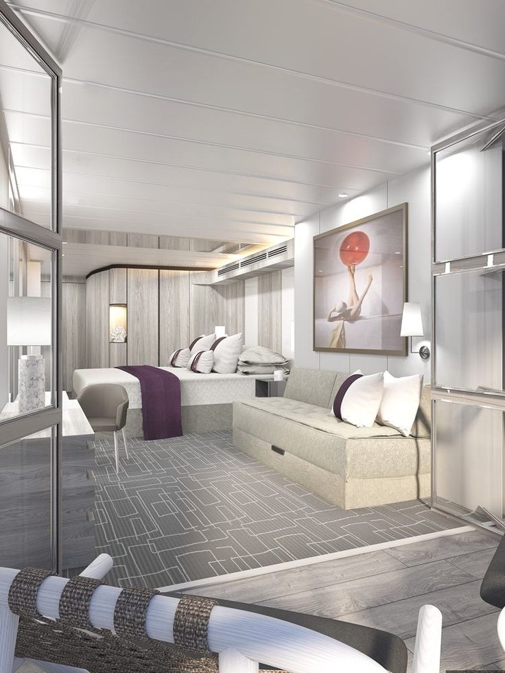 the interior of a hotel room with two beds and one sitting area is shown in this rendering