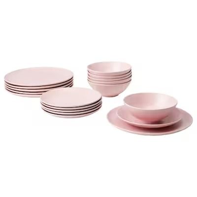 pink dinnerware set on white background