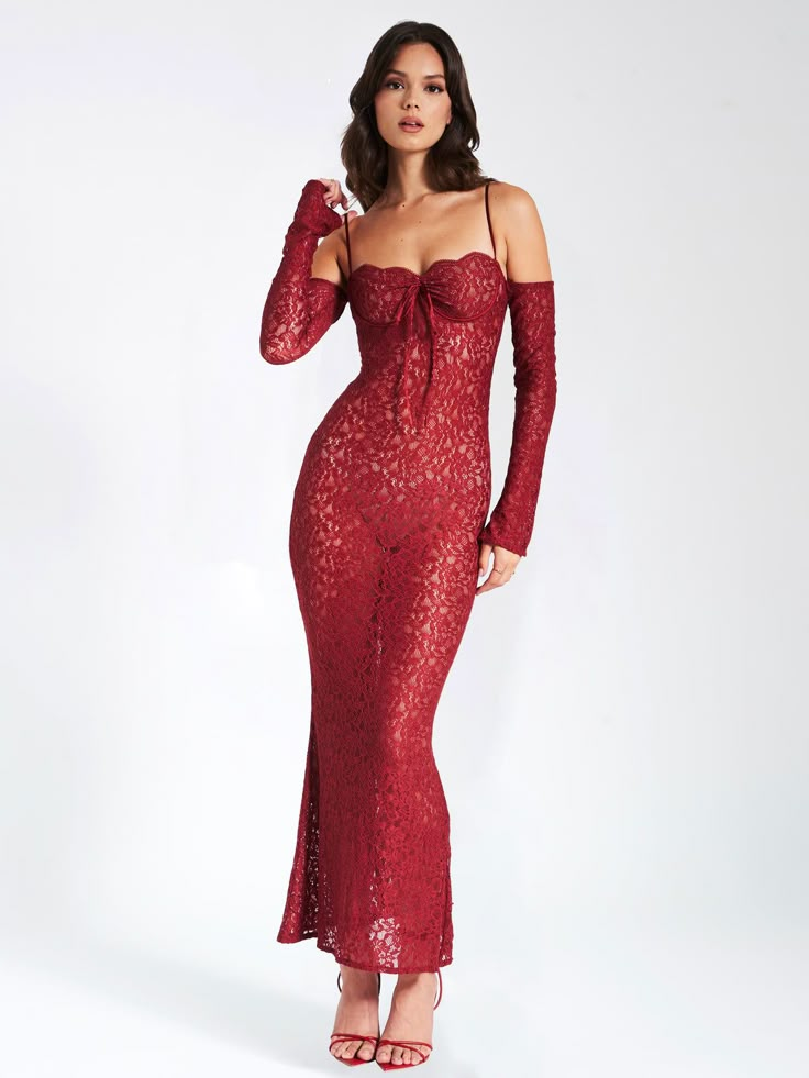 Flaunt your curves in this sexy and stylish sister to our beloved Veronica Lace Maxi Dress. With a slight mermaid silhouette, monowire at bust, and small tie ribbon, you're sure to make an impression wherever you go! The added bonus of lace trim and off-shoulder sleeve with a flare makes this dress the perfect choice for any special occasion or night out. Feel empowered and beautiful strutting your stuff in this sheer lace masterpiece. Show them what you're made of! Available in black and burgun