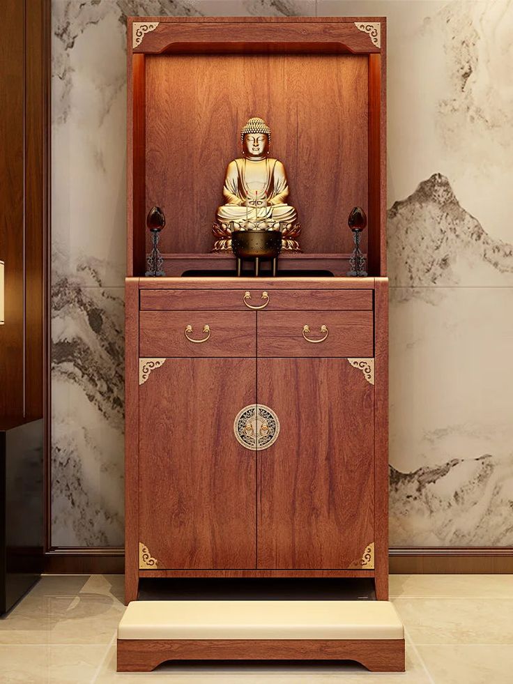 a statue sitting on top of a wooden cabinet next to a wall with marble walls