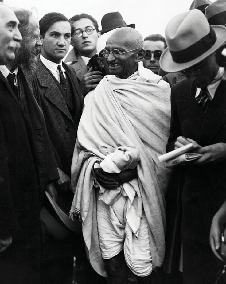 black and white photograph of a man in a crowd