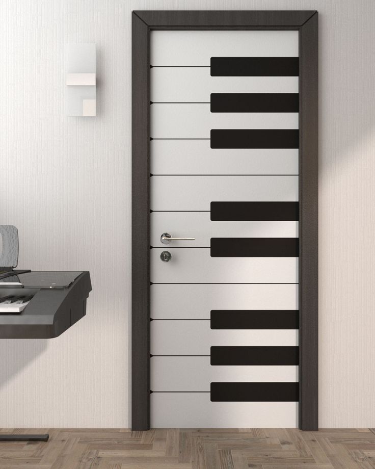 an open door with piano keys painted on it