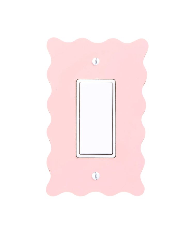 a pink light switch cover with a white button on the left side and two holes in the middle