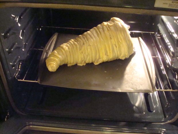 a piece of food is being cooked in an oven