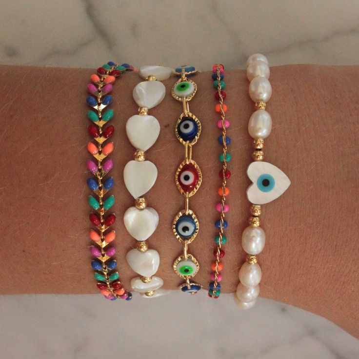 Handmade bracelet. Nacre heart beads. Length: 6" plus 2" extender chain. Made in USA. Evil Eye Beaded Bracelet, Evil Eye Design, Color Bracelet, Pearl Necklace Earrings, Chunky Bracelets, Eye Bracelet, Evil Eye Necklace, Eye Design, Pearl Gemstone