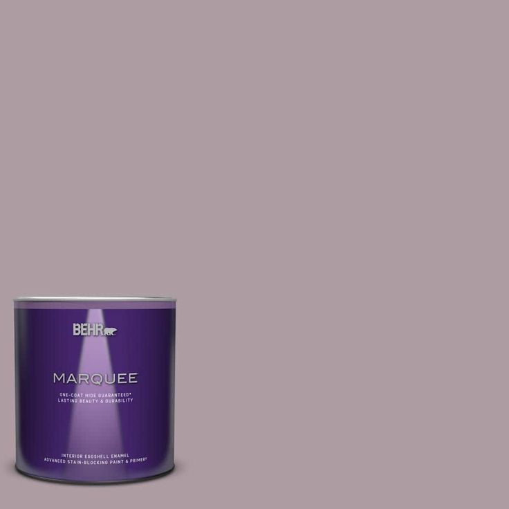 a can of purple paint with the words marquee on it in white lettering