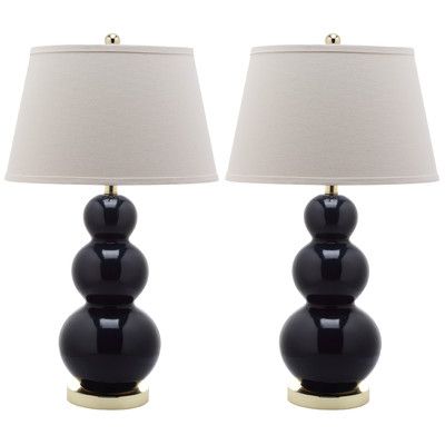 two black lamps sitting next to each other