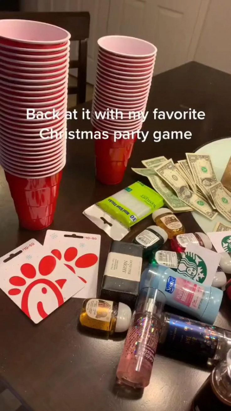 a table topped with lots of cups and money