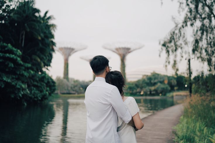 Singapore couple shoot Singapore Couple, Singapore Photoshoot, Prenup Theme, Singapore Garden, Flower Dome, Prewedding Photoshoot, Beach Curls, Singapore Photos, Pink Polo Shirt