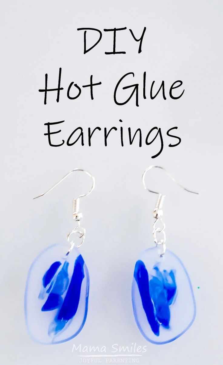 a pair of blue earrings with the words diy hot glue earrings written on it