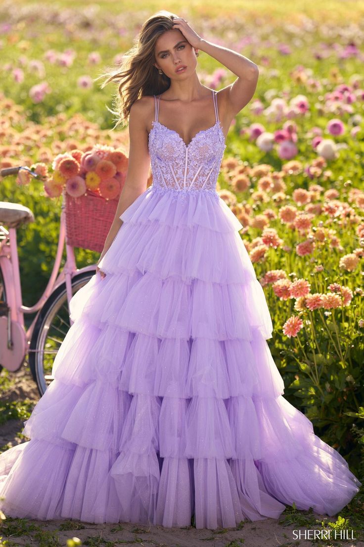 Sherri Hill 56192 Ruffle tulle ballgown with a lace corset bodice and lace up back. Prom Vibes, Ruffle Tulle Dress, Tulle Ballgown, Black Quinceanera Dresses, Red Quinceanera Dresses, Purple Things, Ethereal Dress, Prom Inspo, Sherri Hill Prom