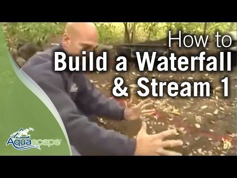 a man holding something in his hands with the words how to build a waterfall and stream 1