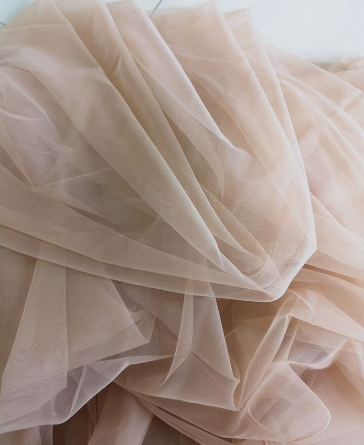 Specification: Colour: Ivory/White/Navy blue/Light gray/Dark gray/Light champagne/Champagne/Dark champagne/Dark pink/Royal blue Composition : Polyester Length : Sell per meter Width : 150 cm / 59 inches Price is per running meter, i.e for the purchase of one unit you will receive 1meter x 1.5 meter tulle. The width is fixed. If you buy 2 we will send you 2 meters X 1.5 meters. This is a superfine high end tulle，It is very delicate and feels super soft. It's perfect for veils and very soft weddin Luxury Pink Fitted Tulle Fabric, Cream Tulle Bridesmaid Dress, Cream Tulle Bridesmaid Wedding Dress, Sheer Cream Tulle Fabric, Cream Embroidered Tulle Fabric, Tule Fabric, Soft Wedding Dresses, Fashion Display, Custom Corsets