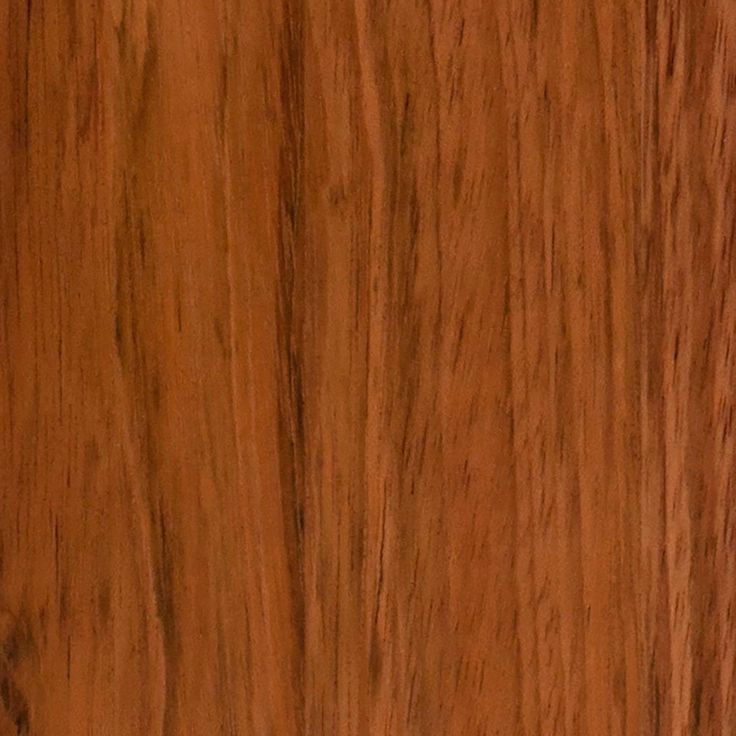 a close up view of a wooden surface with some grainy woodgrains on it