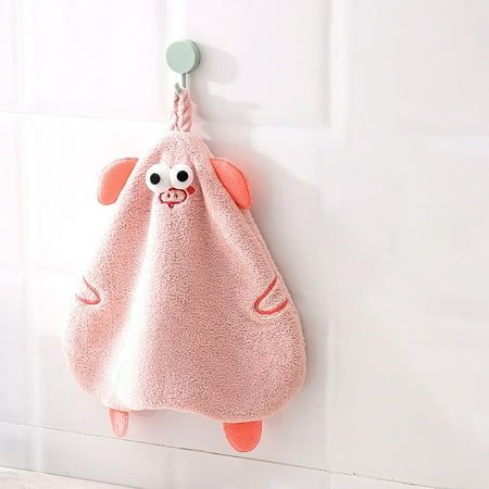 a pink towel hanging on a hook in a bathroom