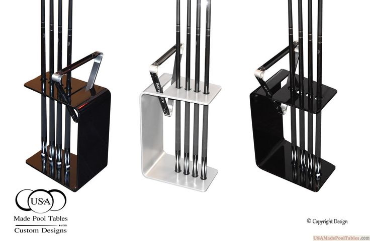 three different types of black and white metal racks with forks in them, one on top of the other