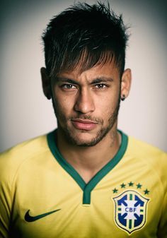 a soccer player poses for a photo in his brazil kit during the 2010 world cup