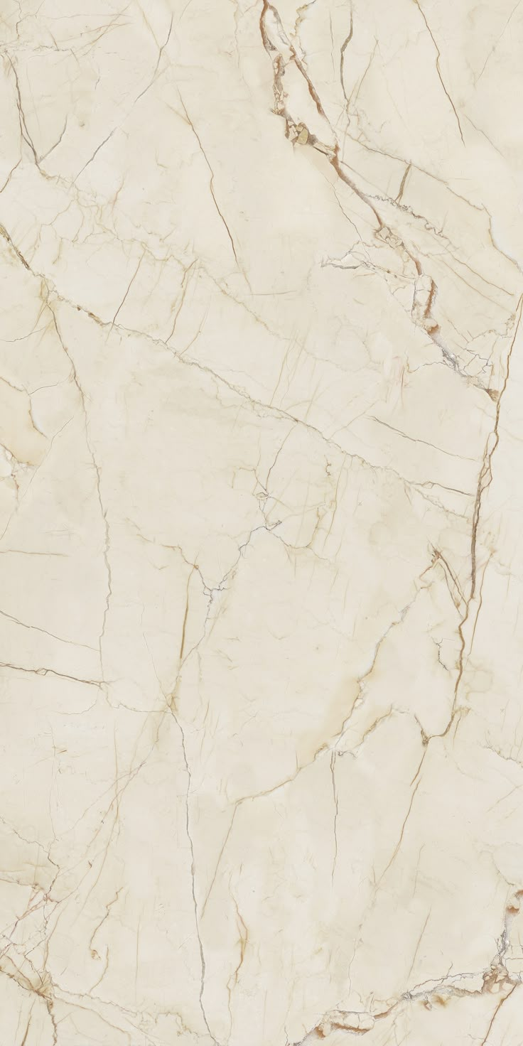 a white marble textured surface with brown lines