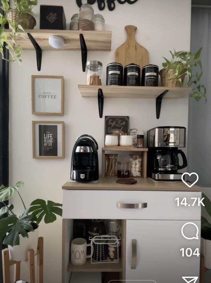 a coffee bar with shelves and cups on the wall, along with other decor items