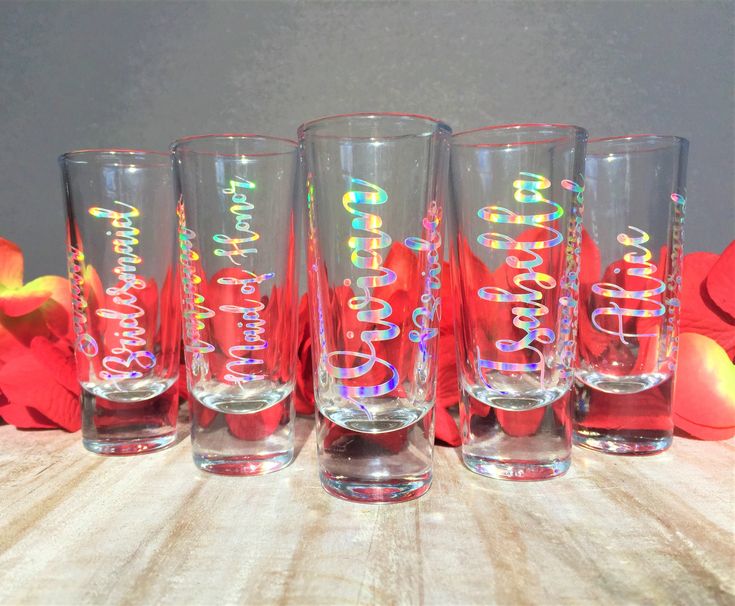 four glasses with the words happy birthday on them