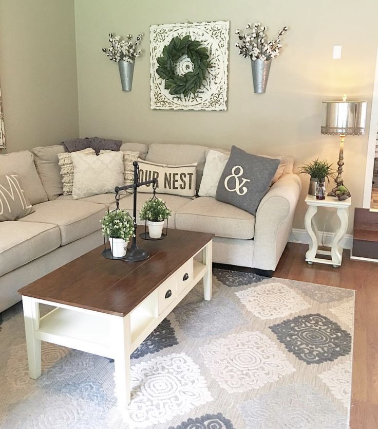 the living room is clean and ready to be used for christmas decorations, including wreaths on the wall