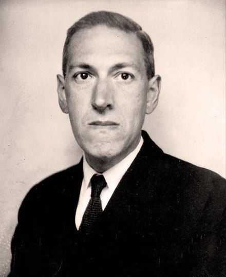 an old black and white photo of a man in a suit with a serious look on his face