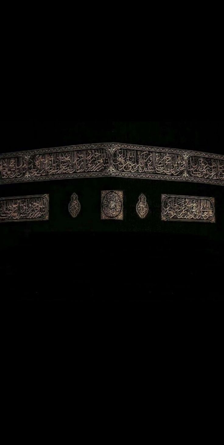 an intricately designed metal object in the dark