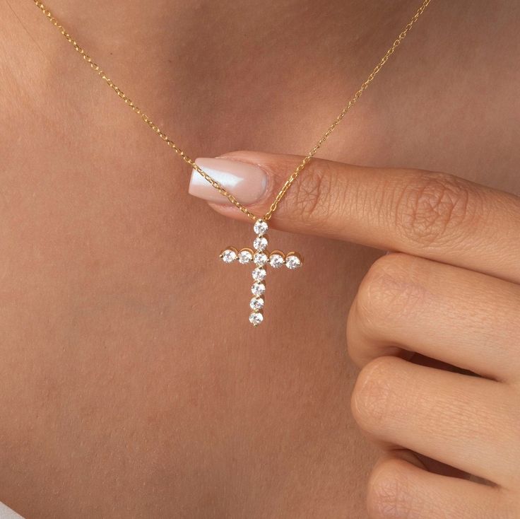 Experience the captivating allure of our exquisite 14k Gold Diamond Cross Pendant Necklace. Meticulously crafted with a seamless blend of elegance and spirituality, this breathtaking piece of fine jewelry is a true testament to exceptional craftsmanship. Alternatively, choose from our options of natural diamonds, lab-grown diamonds or dazzling moissanites at three different price points to fit your unique preferences and budget. Please check below to see specifications of each stone option. All Elegant Pendant Cross Necklace With Clavicle Chain, Elegant Cross Pendant Necklace With Clavicle Chain, Elegant Necklace With Clavicle Chain And Cross Pendant, Elegant Clavicle Chain Jewelry With Cross Pendant, Elegant Clavicle Chain With Cross Pendant Jewelry, Elegant Clavicle Chain With Cross Pendant, Elegant Gold Cross Necklace With Round Pendant, Elegant Clavicle Chain Cross Necklace For Gift, 14k Gold Spiritual Cross Pendant Necklace