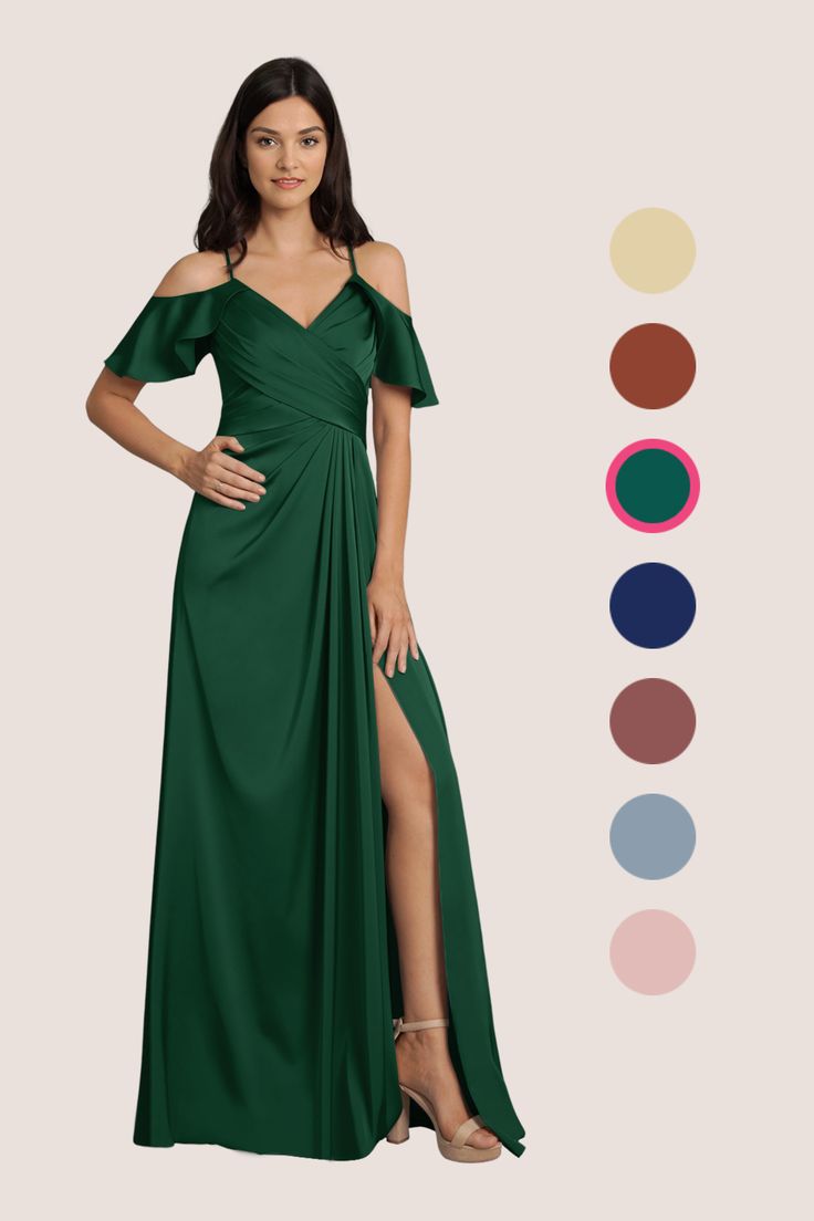 a woman in a long green dress standing next to color swatches and the colors