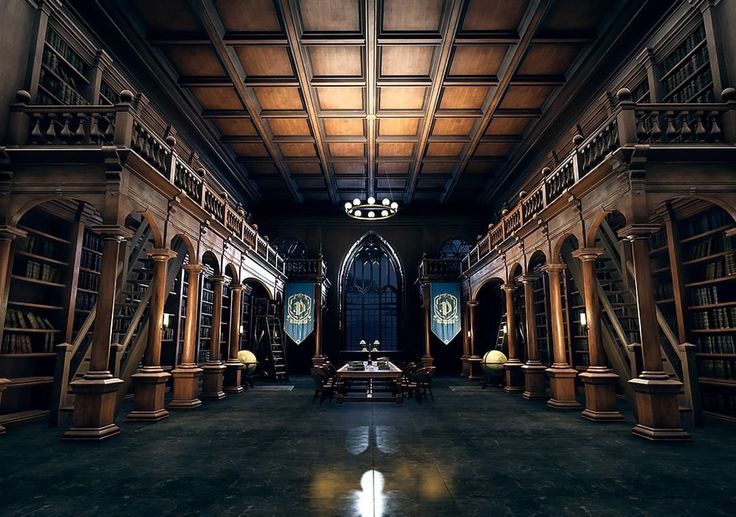 an empty library with many bookshelves and tables in it's center area