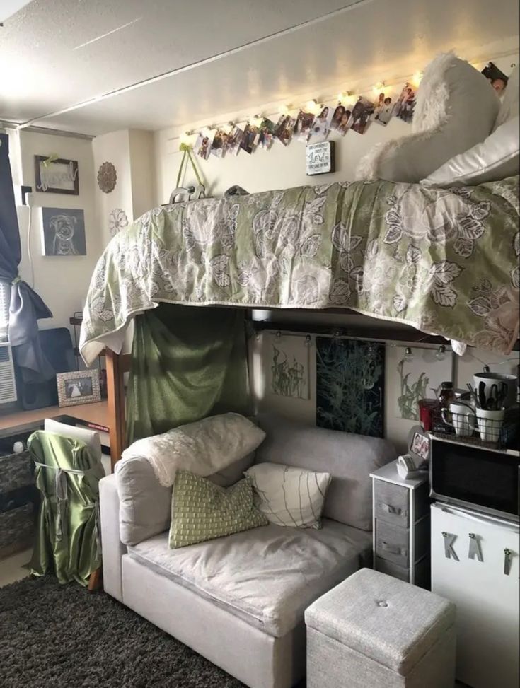 a loft bed with a couch underneath it