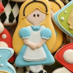 there are many decorated cookies in the shape of characters