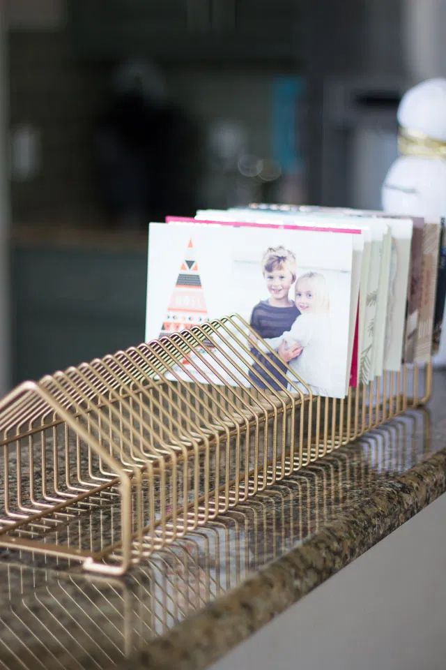 a stack of magazines sitting on top of a counter