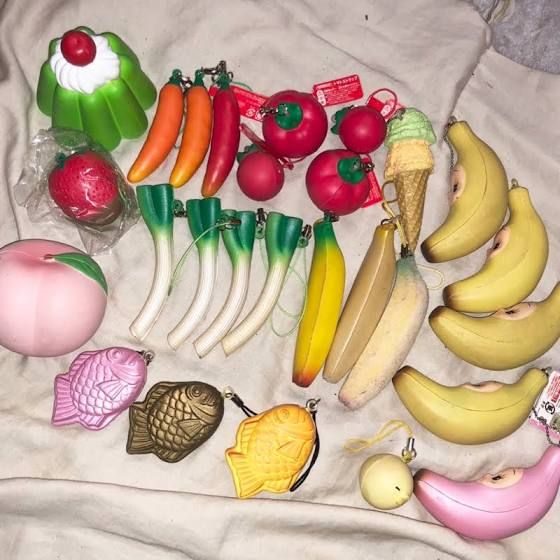 there are many different fruits and vegetables on the table together, including bananas, apples, carrots, pears, watermelon