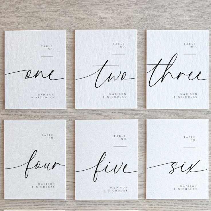 four different types of calligraphy on white paper