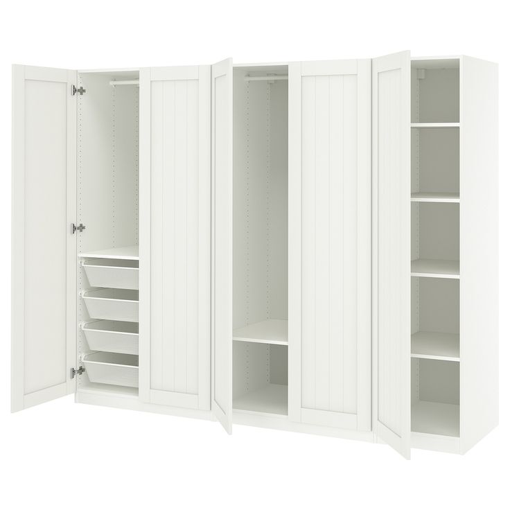 an open white cabinet with shelves and drawers